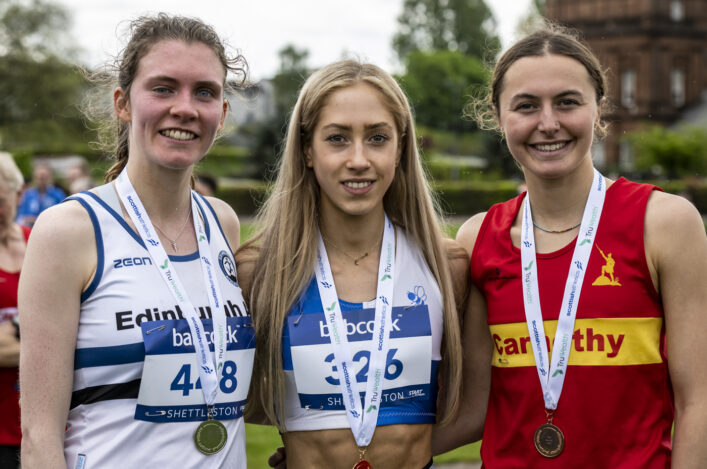 Natasha lands Course Record to complete Scottish road race title hat-trick - as John wins first gold