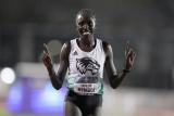 DyeStat.com - News - Track Recap: Patience Pays Off For Utah Valley's Everlyn Kemboi