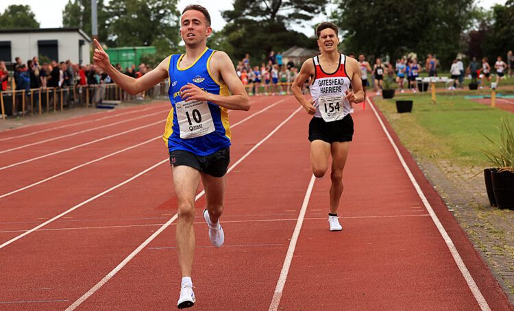 Adrian Bailes wins the Stan Long Mile